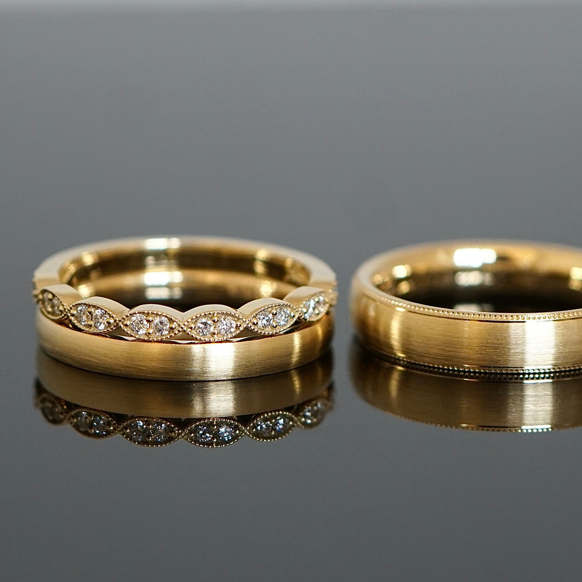 Eheringe ganz nach deinen Wünschen mit Millgriffrand und Vorsteckring mit Diamanten