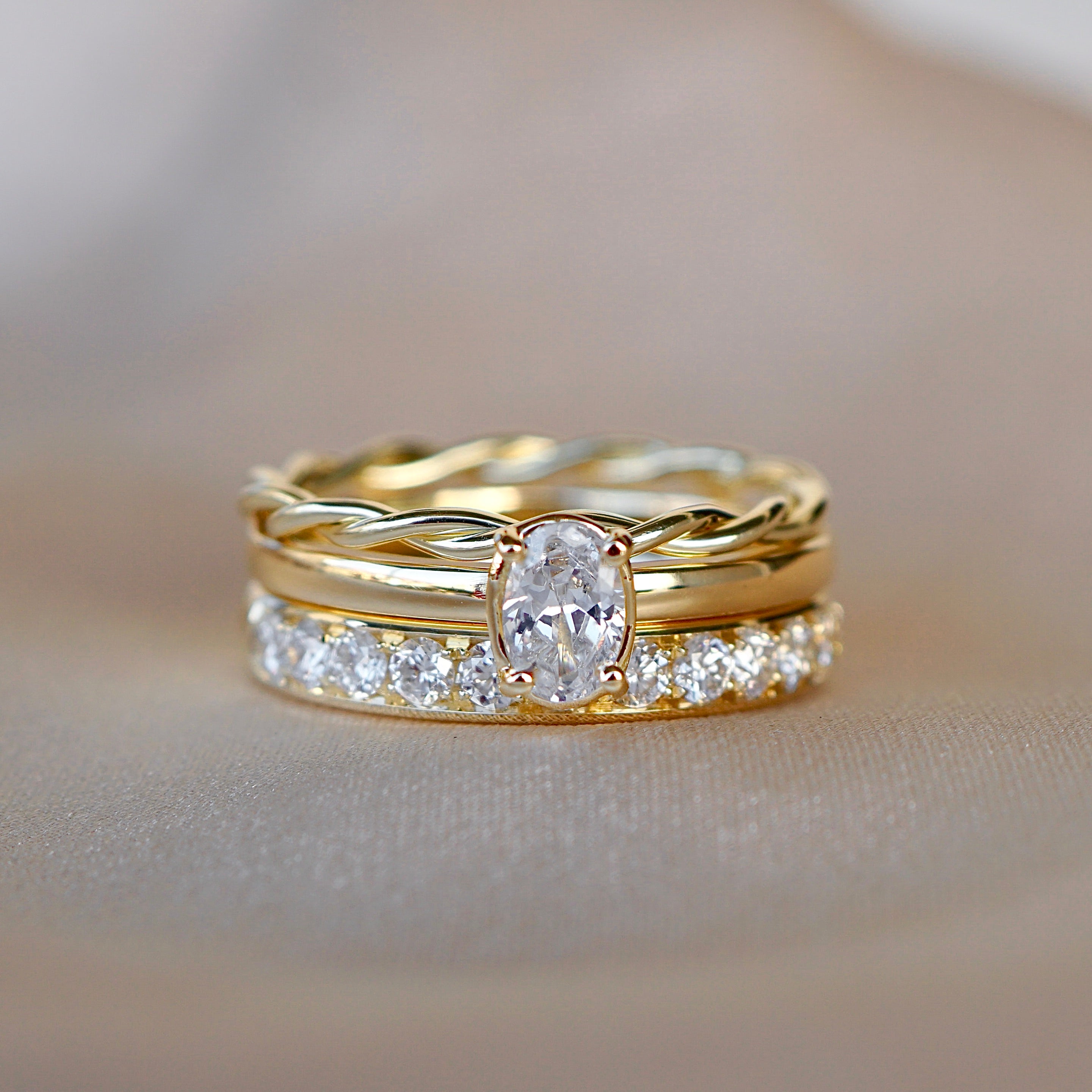 Kombination aus drei Ringen mit Memoryring und Ring mit 0,50 Ct. Diamant, Kordelring