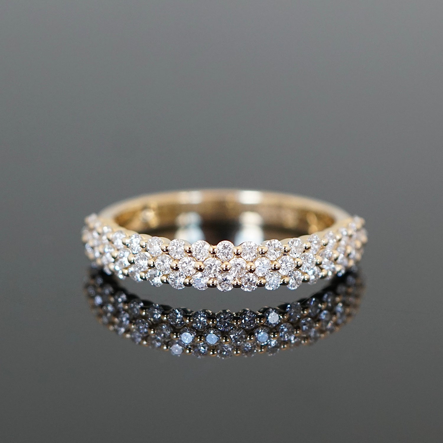Memoyring mit drei unregelmäßigen Reihen Brillanten 