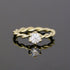 Kordelring mit einem Halbkaräter Diamanten aus Gold, gedrehter Ring Kordelung mit 0,50 Brillanten