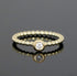 Vorsteckring mit zarten Kugeln und runder Fassung mit Diamant 
